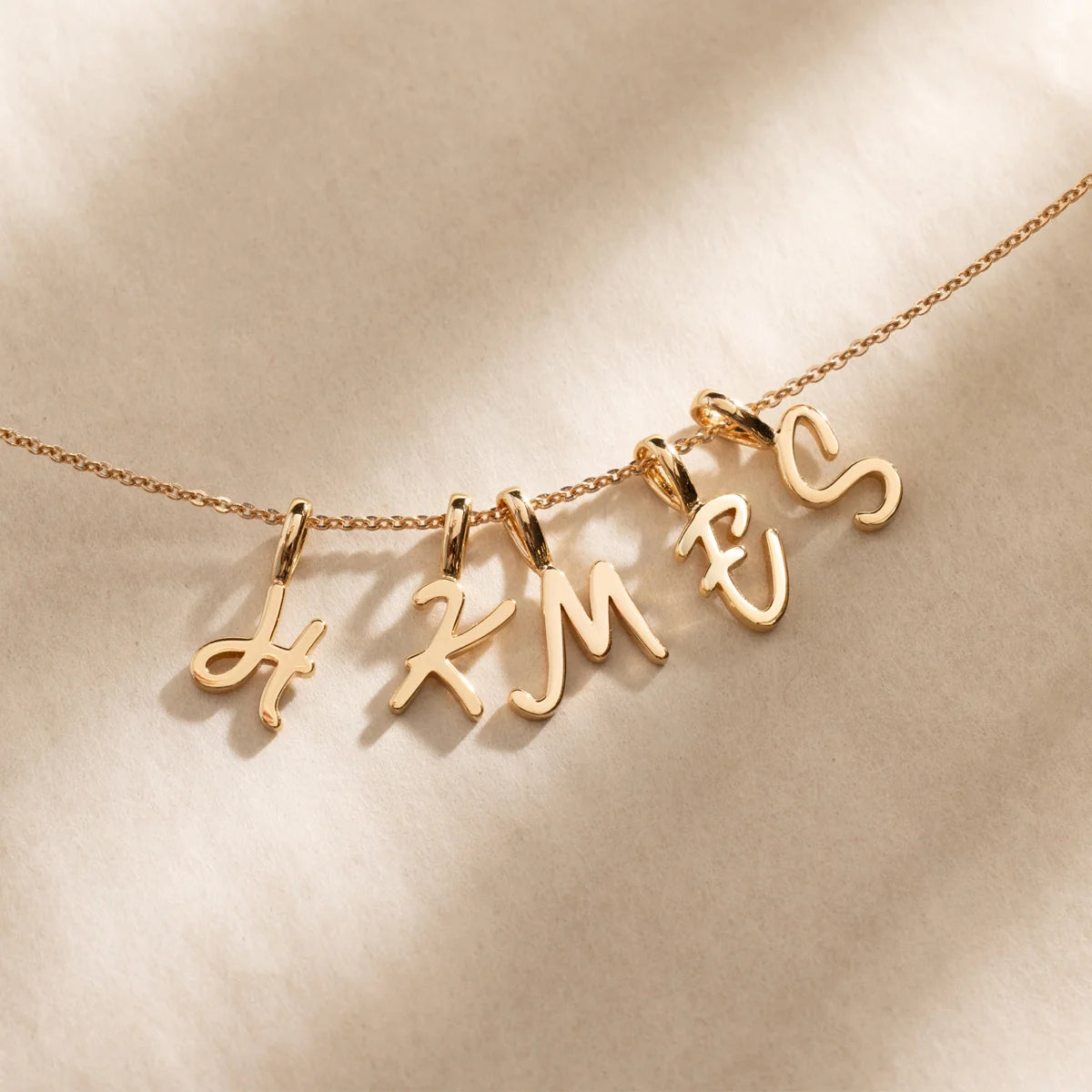 Script Initial M Charm